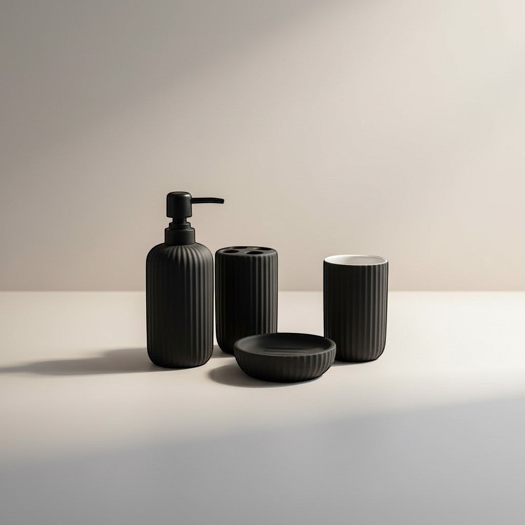 Home Appeal matte black ribbed bathroom accessory set including soap dispenser, toothbrush holder, cup, and soap dish.